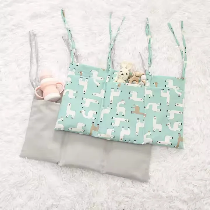 organizator2 Pamučni organizator za dječji krevetić – višenamjenska torba za bebe 🌿